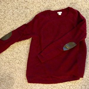 Crew neck burgundy sweater.